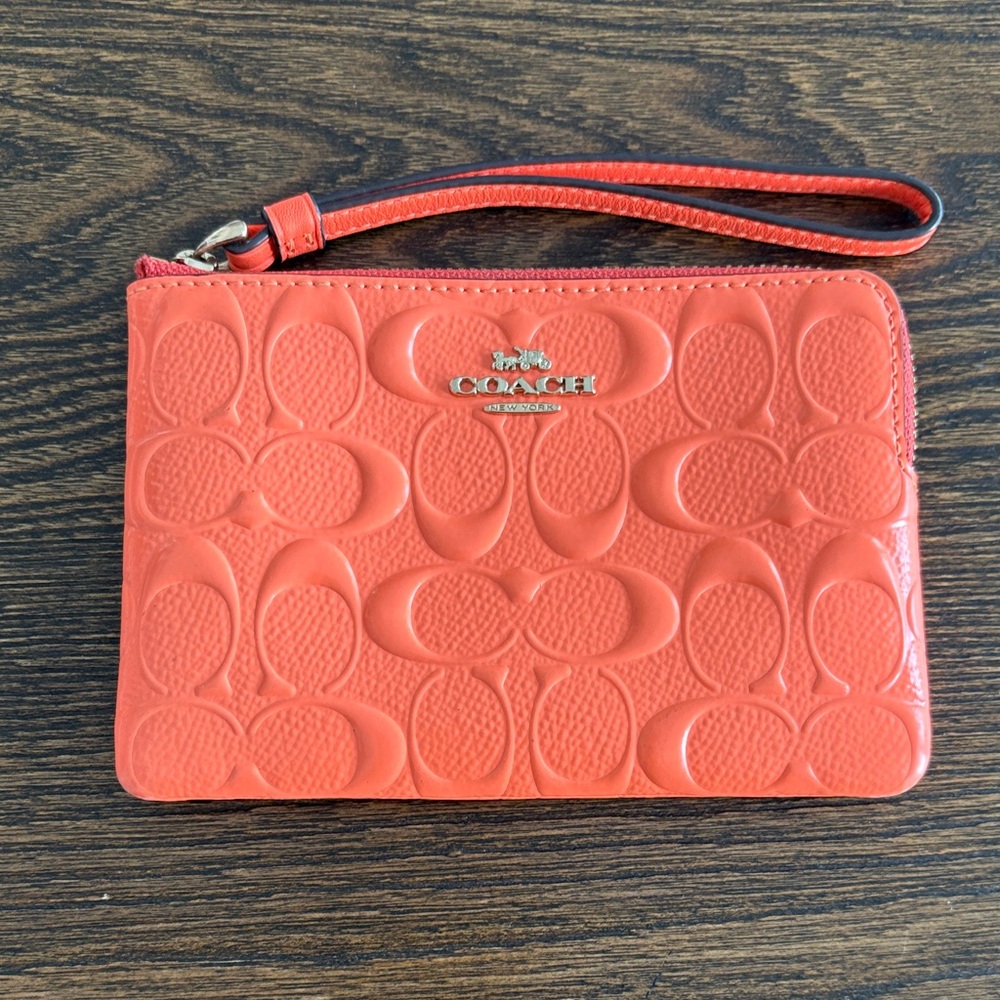 Coach Orange Embossed Signature Wristlet w/ Gold Hardware